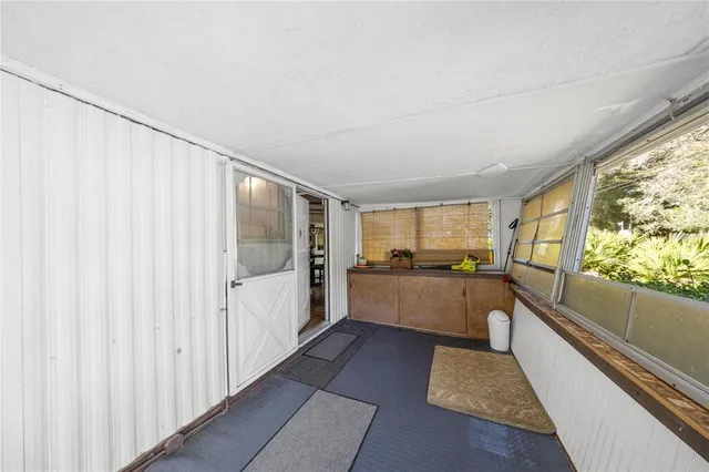 a large living room with a large window