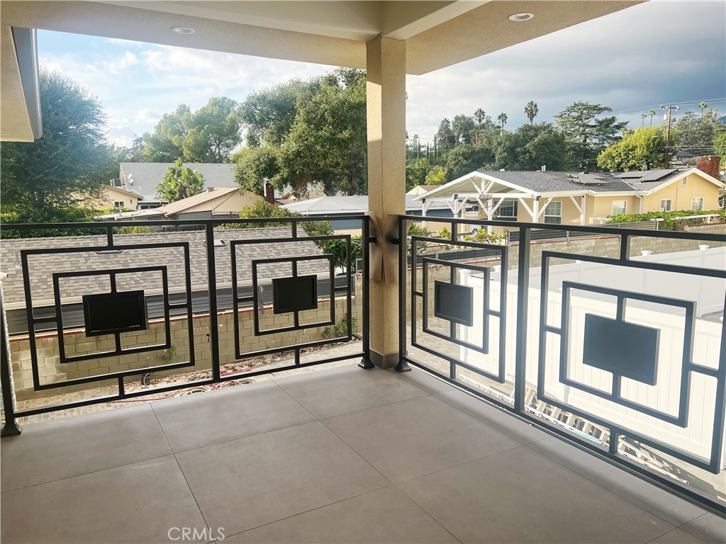 1514 East Woodbury Road, Unit 1/2 Pasadena, CA 91104 - Photo 9 of 14 a view of a house with a porch