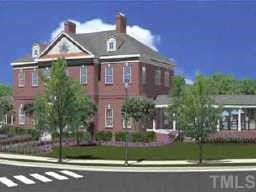 1111 Consortium Drive, Unit 112 Raleigh, NC 27603 - Photo 2 of 7 a front view of a house with a yard