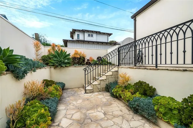 a living room with furniture fireplace and flat screen tv