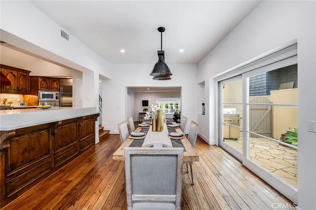 a kitchen with a cabinets and a stove top oven