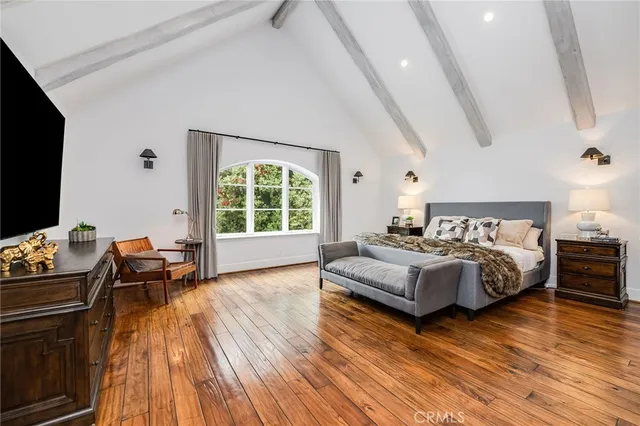 a spacious bathroom with a double vanity sink and a mirror