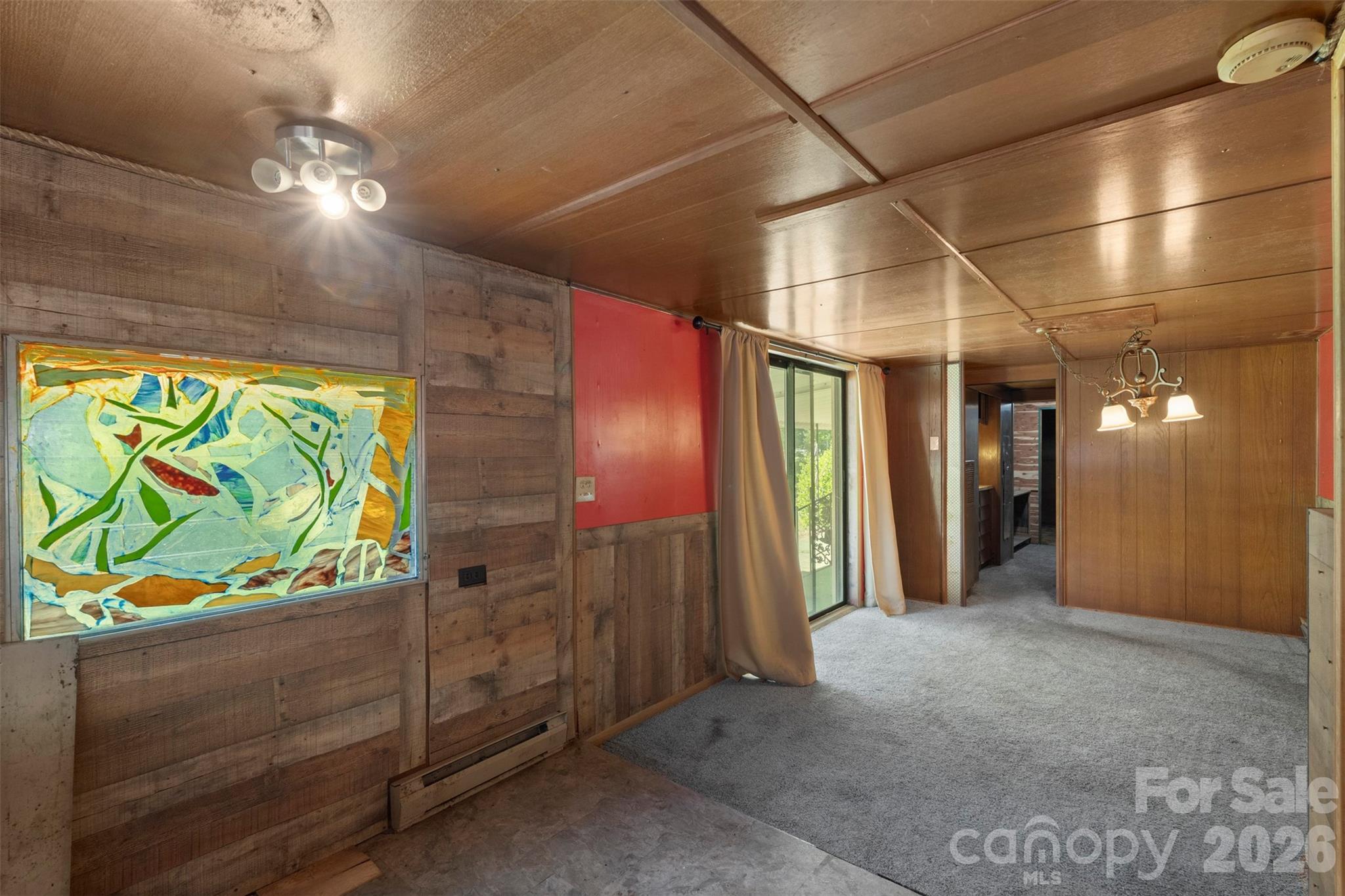 5208 Hickory Grove Road Mount Holly, NC 28120 - Photo 15 of 44 a view of a hallway with wooden floor