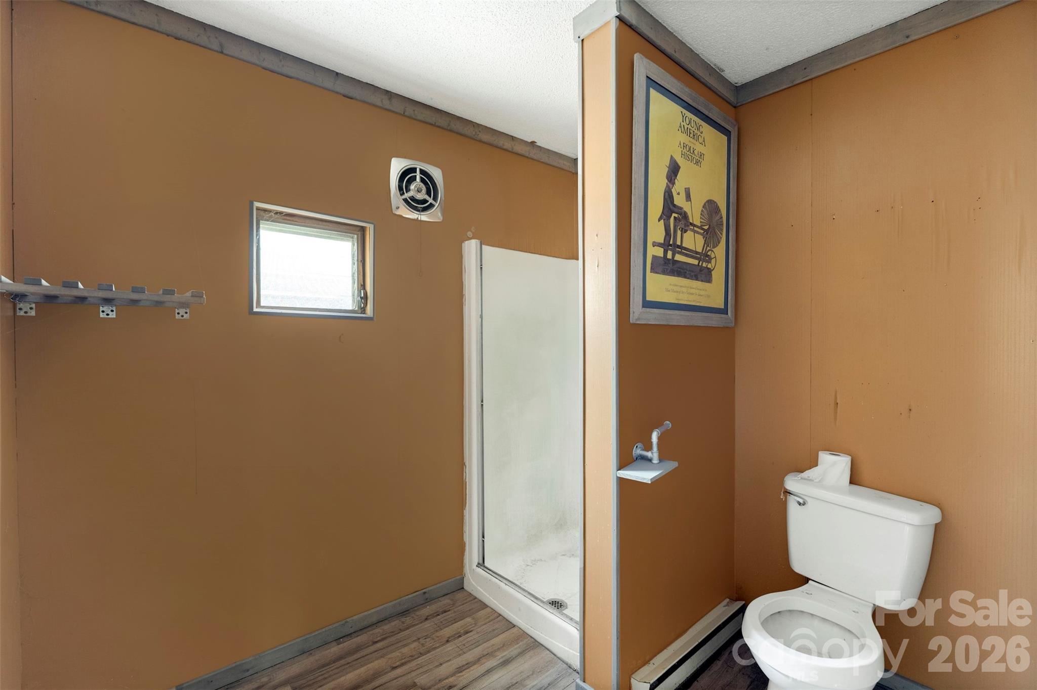 5208 Hickory Grove Road Mount Holly, NC 28120 - Photo 23 of 44 a bathroom with a toilet and a shower