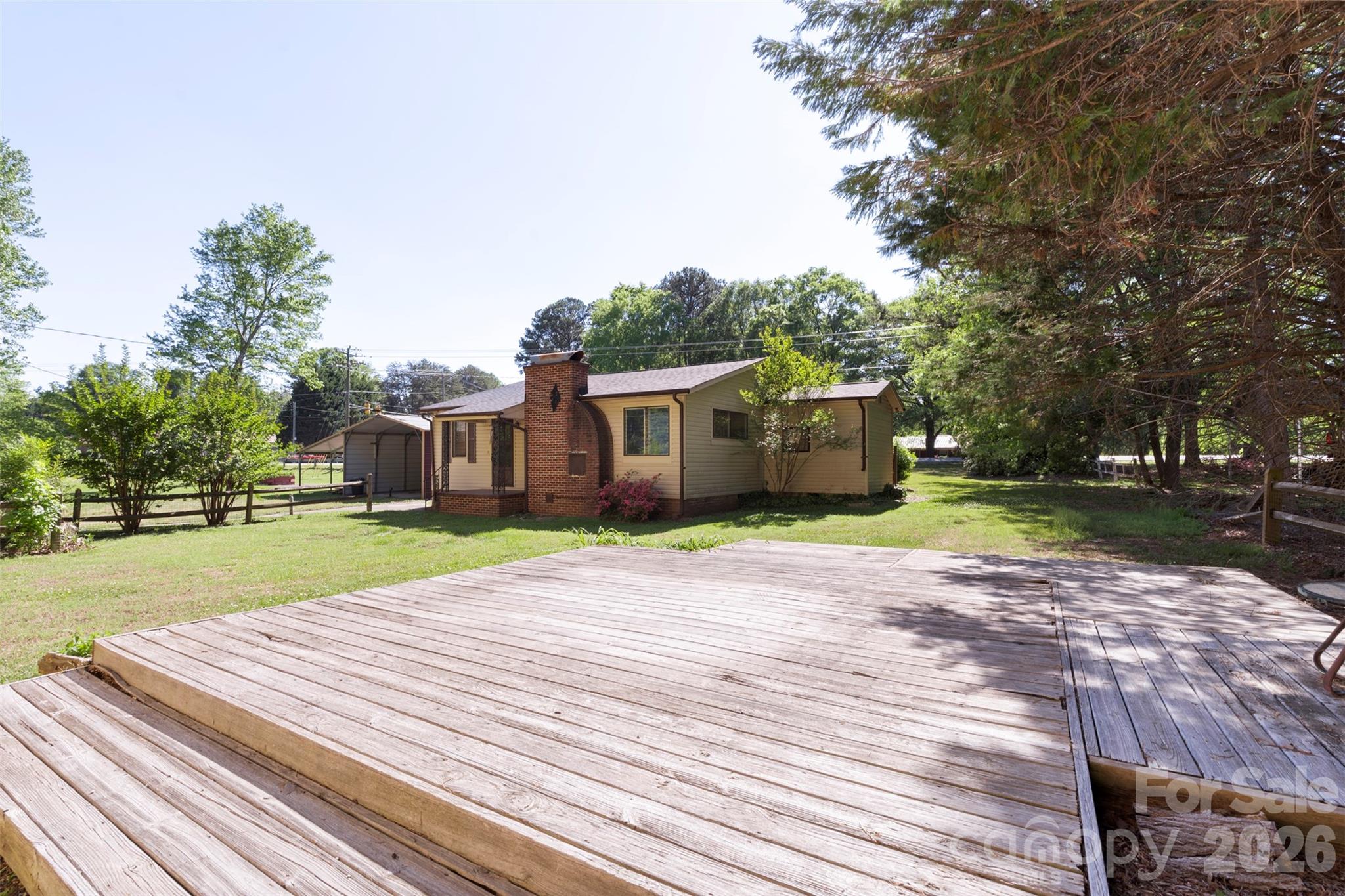 5208 Hickory Grove Road Mount Holly, NC 28120 - Photo 25 of 44 a view of a house with a yard