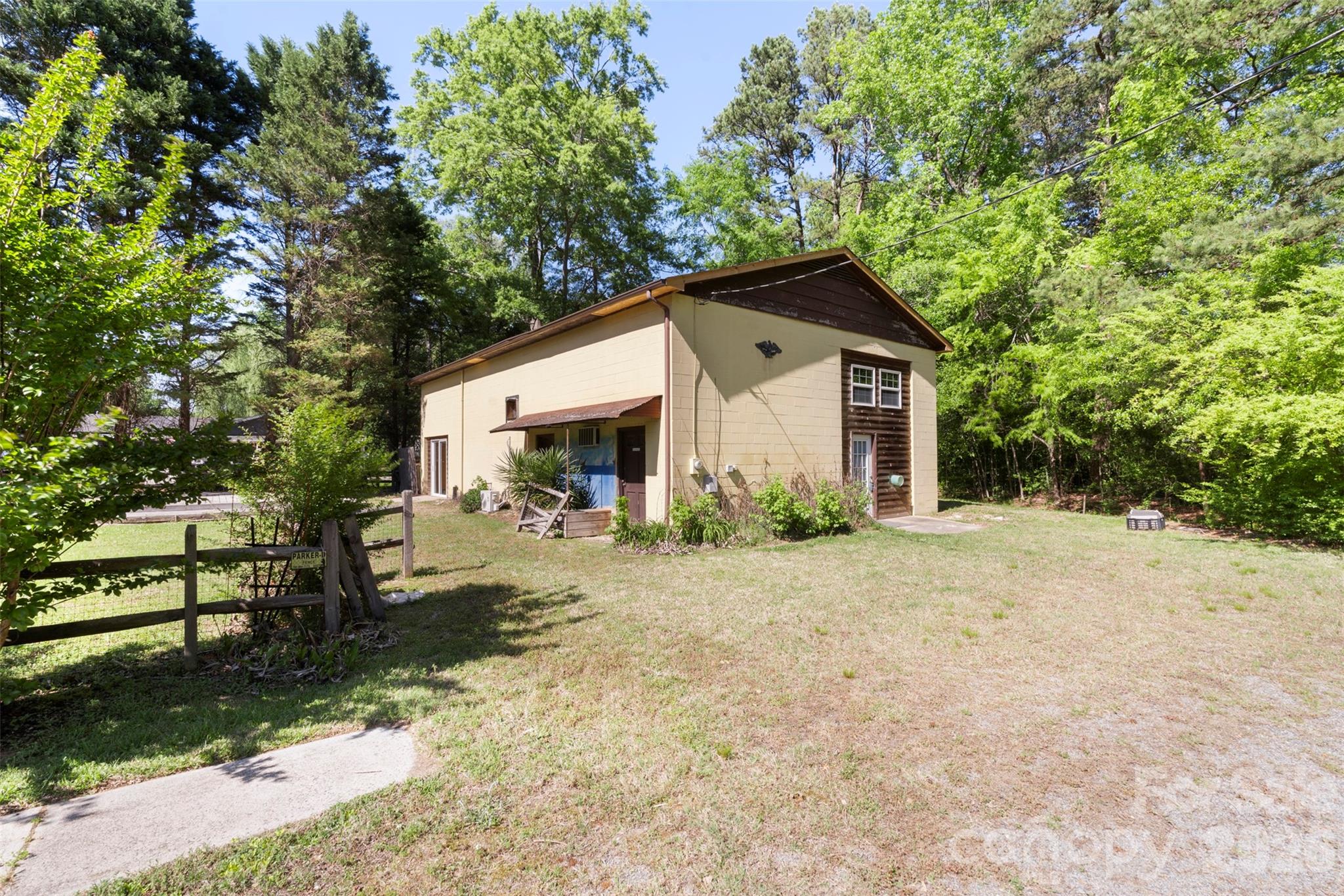 5208 Hickory Grove Road Mount Holly, NC 28120 - Photo 27 of 44 a front view of a house with a yard