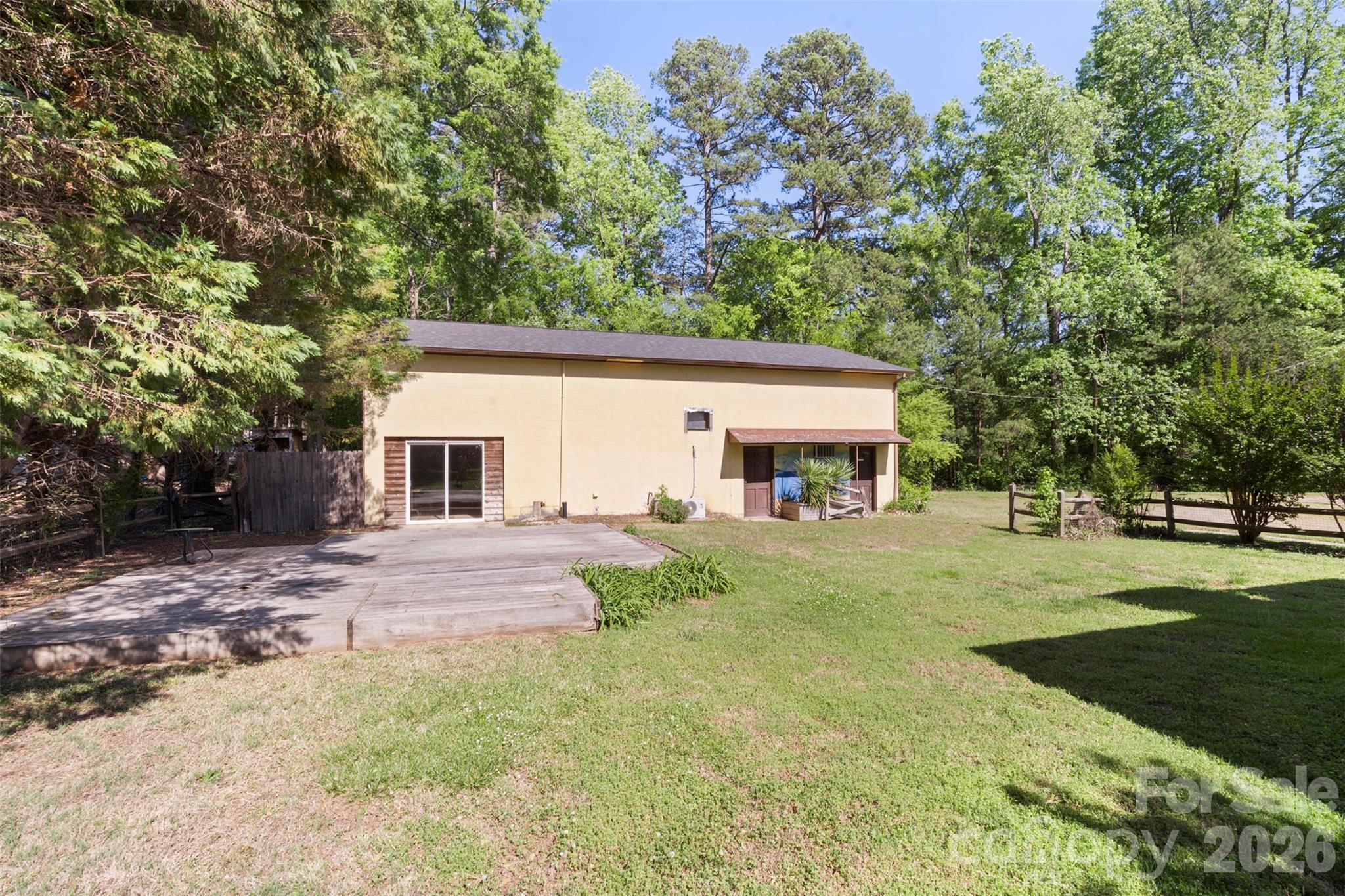 5208 Hickory Grove Road Mount Holly, NC 28120 - Photo 29 of 44 a view of a yard in front of a house with large trees