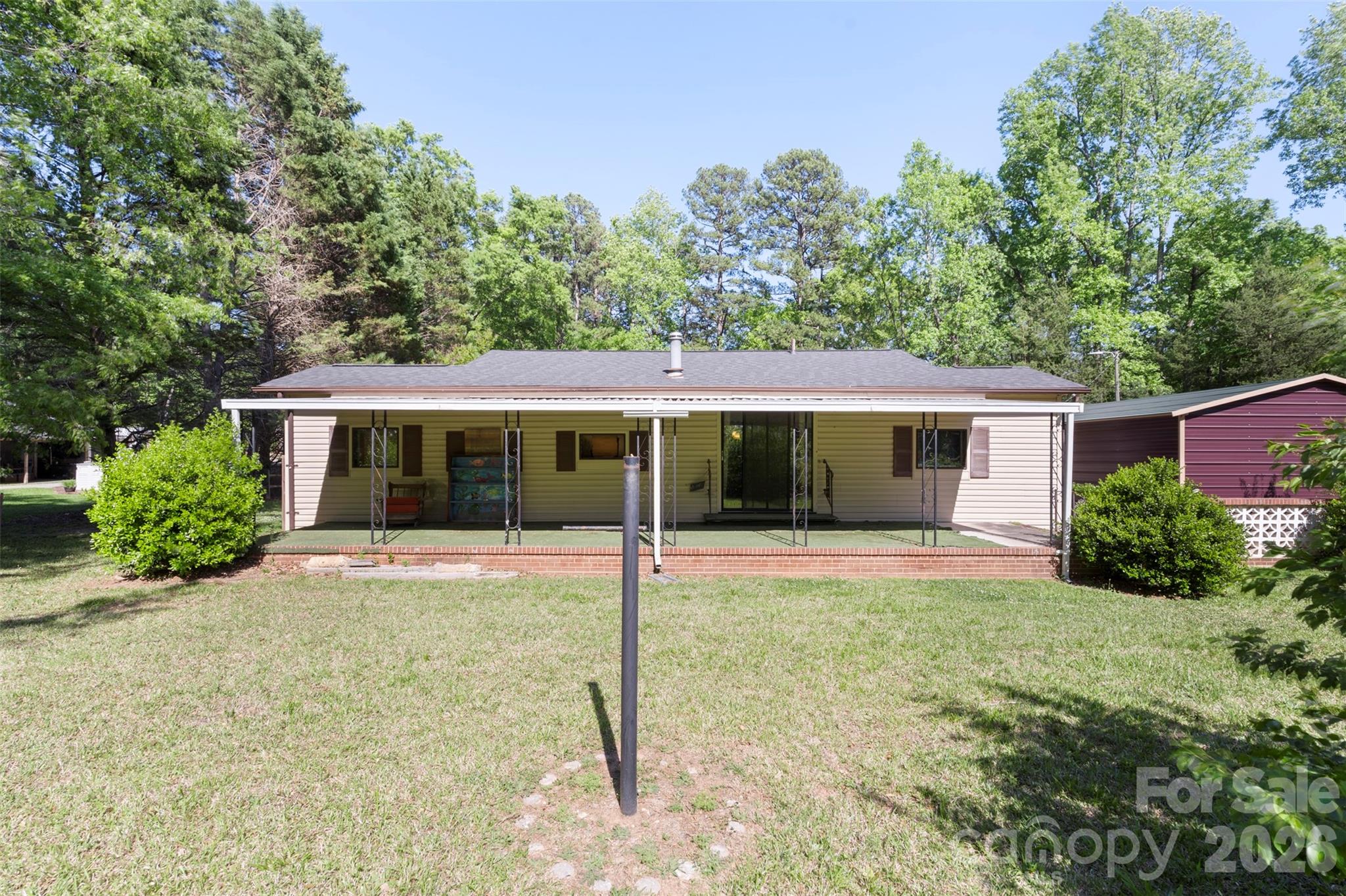 5208 Hickory Grove Road Mount Holly, NC 28120 - Photo 6 of 44 a front view of house with yard and green space
