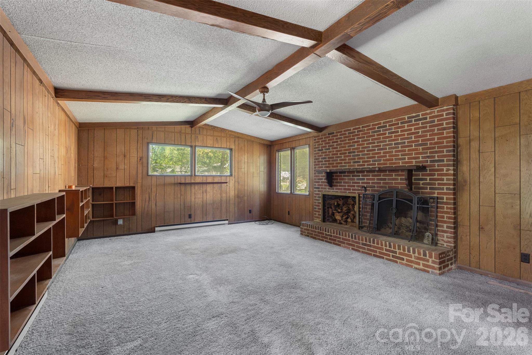 5208 Hickory Grove Road Mount Holly, NC 28120 - Photo 10 of 44 an empty room with furniture and windows