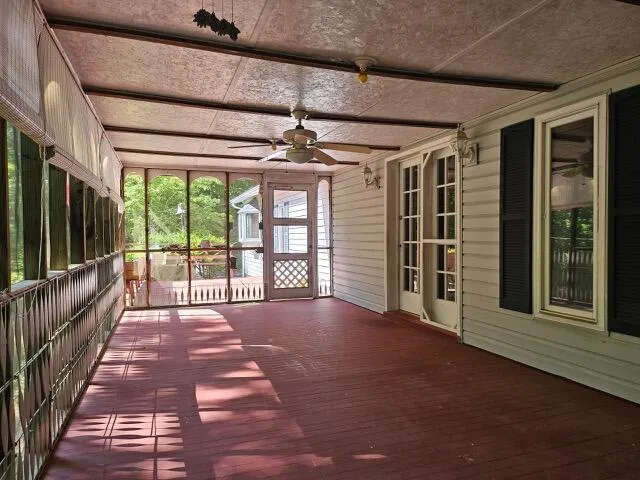 a view of a balcony with chairs