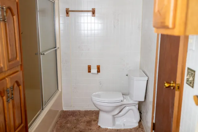 a view of an entryway with a chandelier