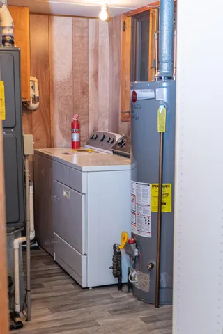 a stove top oven sitting inside of a kitchen