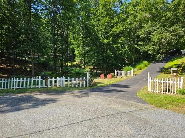 a view of street along with trees