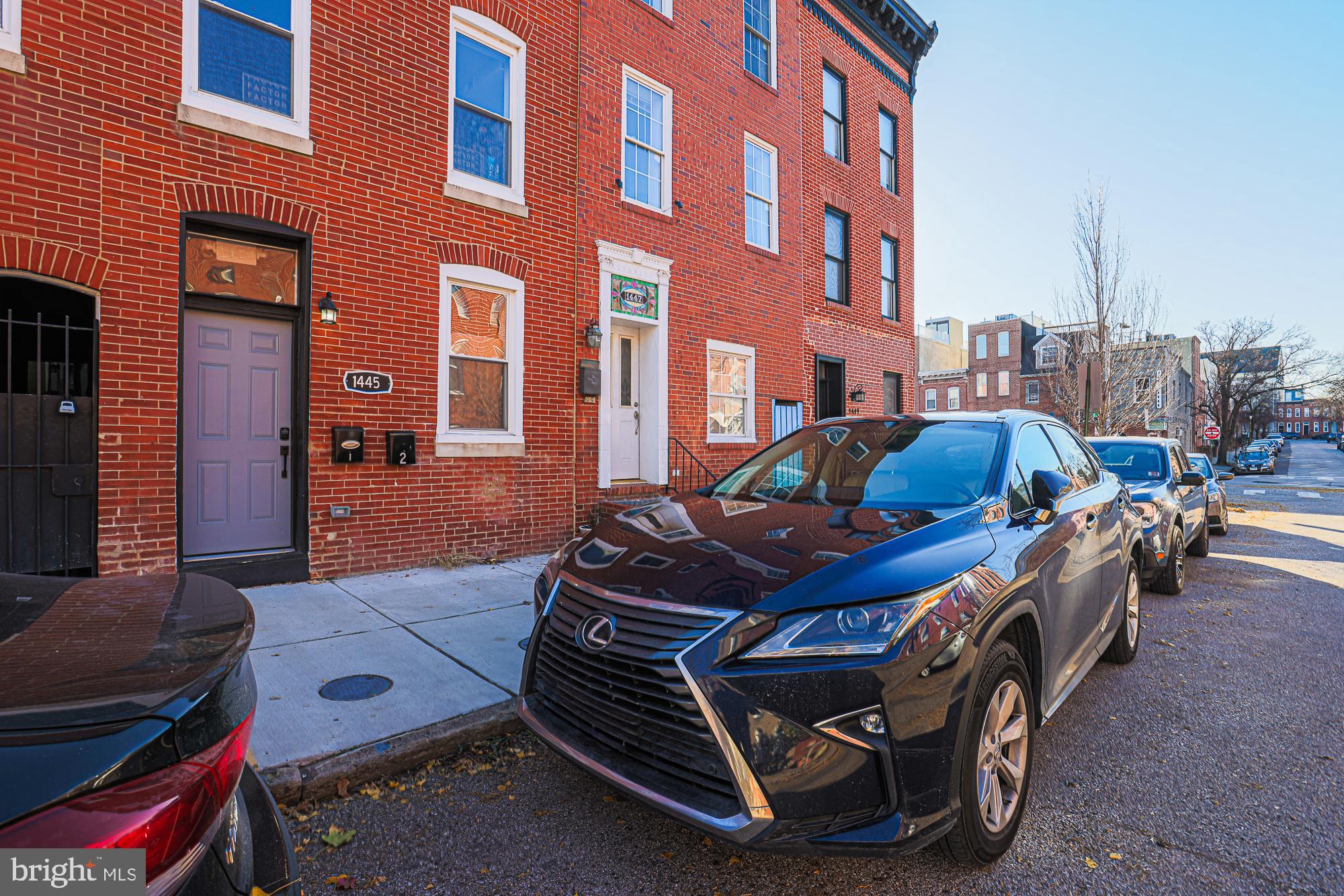 1447 William Street Baltimore, MD 21230 - Photo 2 of 72 a front view of a building with outdoor seating