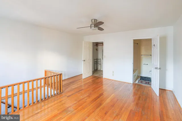 a bathroom with a bathtub and a toilet
