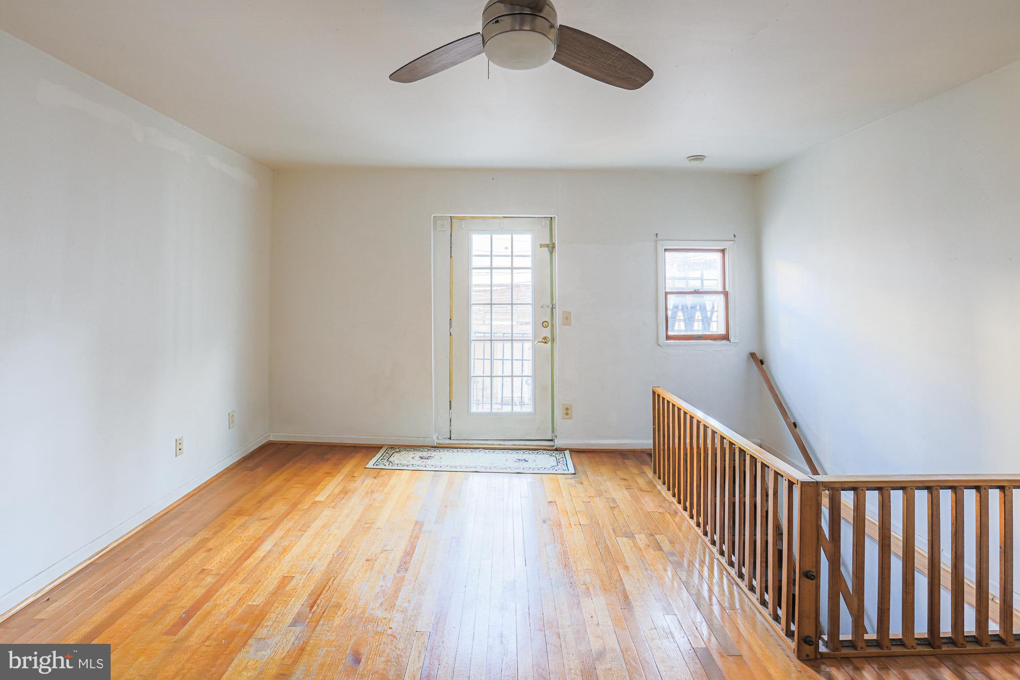 1447 William Street Baltimore, MD 21230 - Photo 23 of 72 a view of a room with wooden floor fan and windows