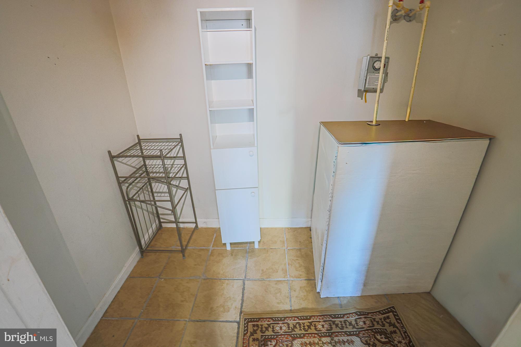 1447 William Street Baltimore, MD 21230 - Photo 26 of 72 a bathroom with a sink and a mirror