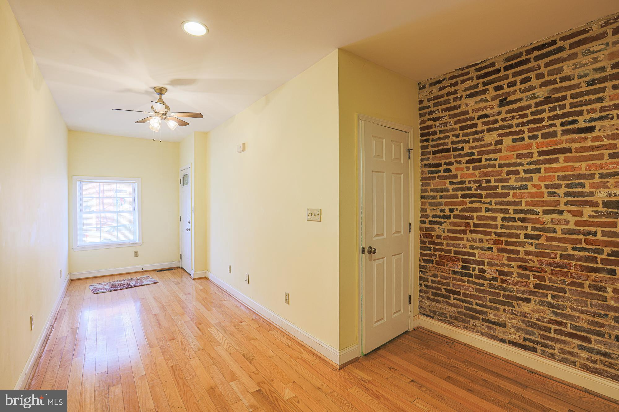 1447 William Street Baltimore, MD 21230 - Photo 27 of 72 a view of a livingroom with wooden floor
