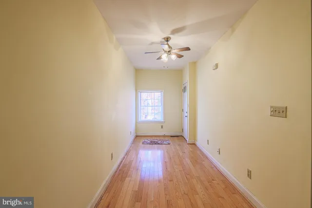 a view of a house with a street