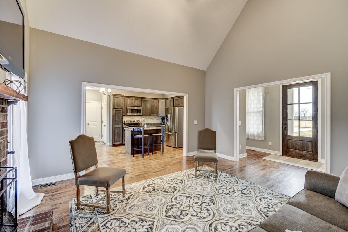 439 Tom Link Road Cottontown, TN 37048 - Photo 6 of 20 a living room with furniture and wooden floor