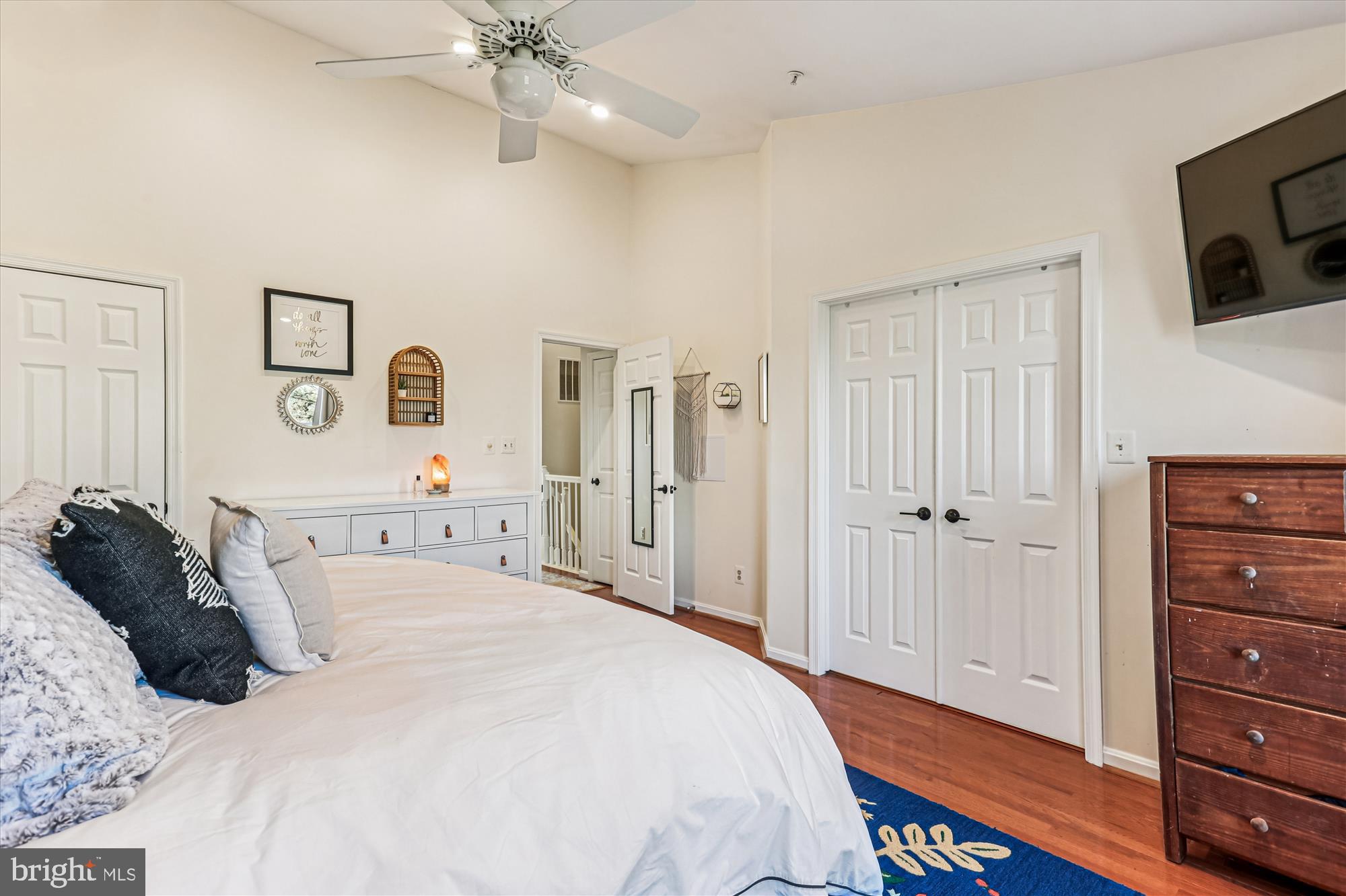 730 Kent Oaks Way Gaithersburg, MD 20878 - Photo 20 of 65 a bedroom with a bed and a flat screen tv