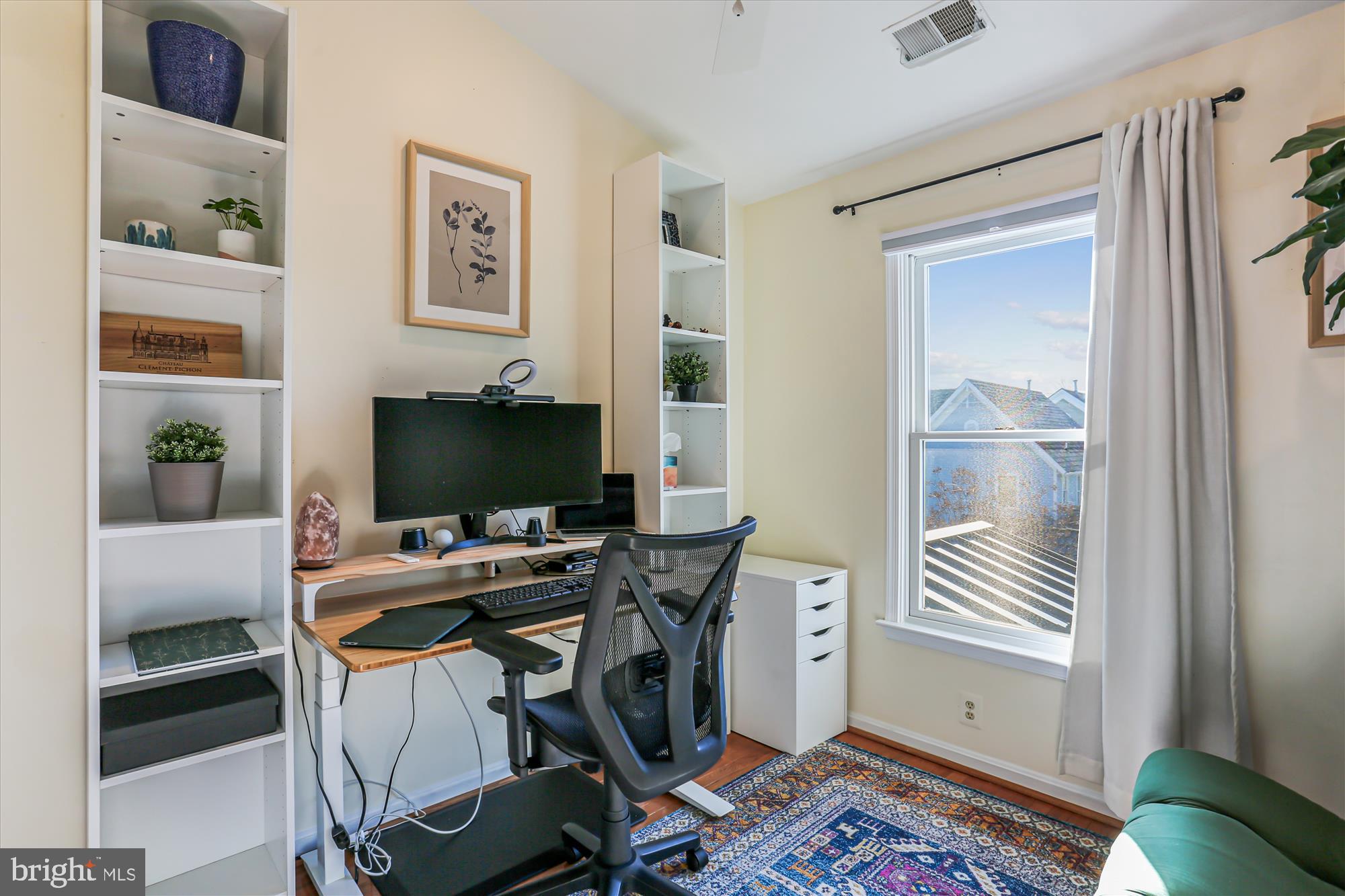 730 Kent Oaks Way Gaithersburg, MD 20878 - Photo 27 of 65 a workspace with furniture and wooden floor