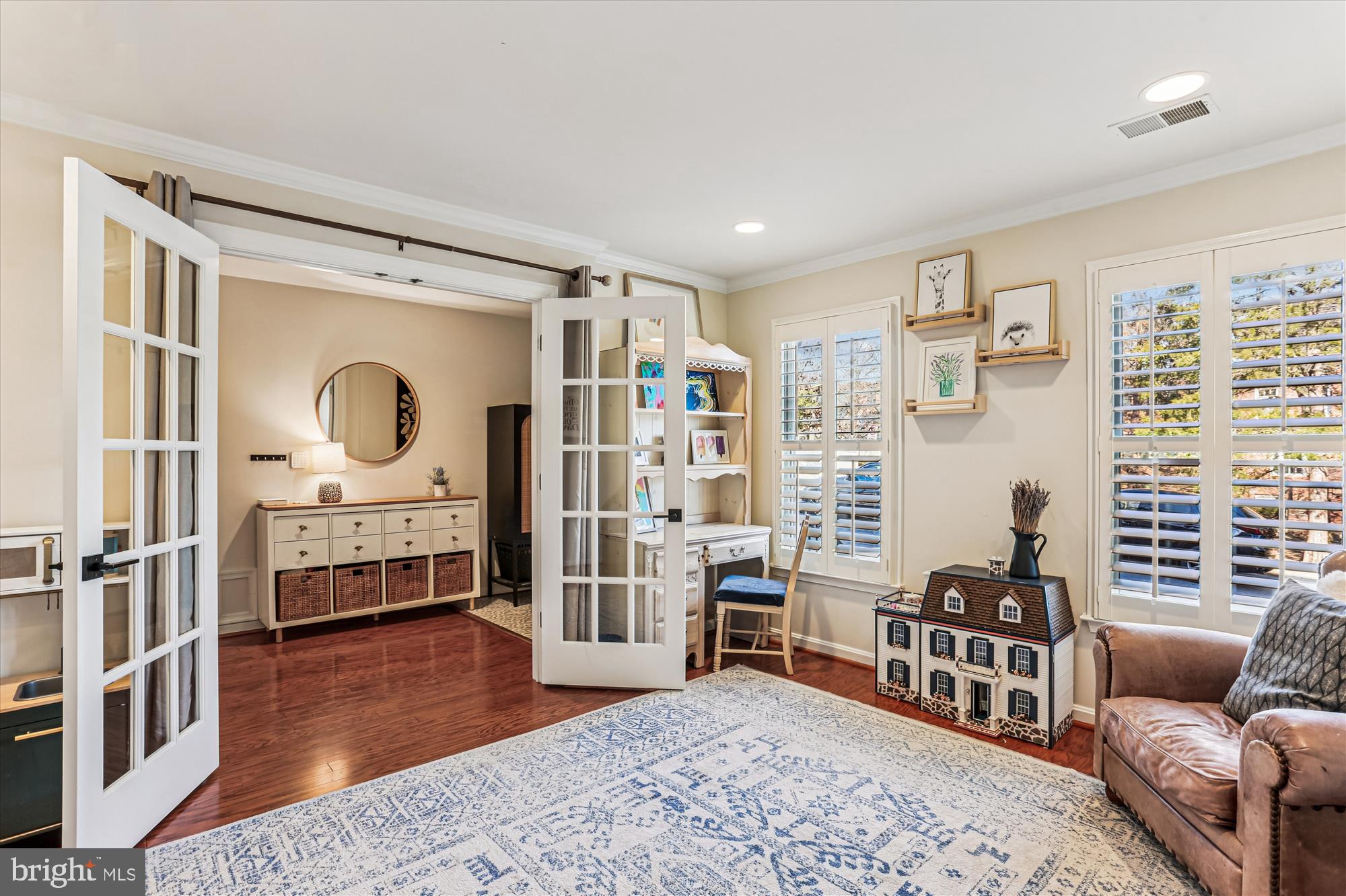 730 Kent Oaks Way Gaithersburg, MD 20878 - Photo 34 of 65 a bedroom with furniture and a wooden floor