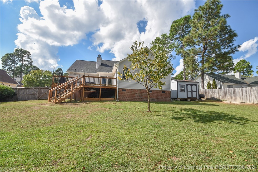184 Chesapeake Road Cameron, NC 28326 - Photo 49 of 50 a small yard with trees in front of it