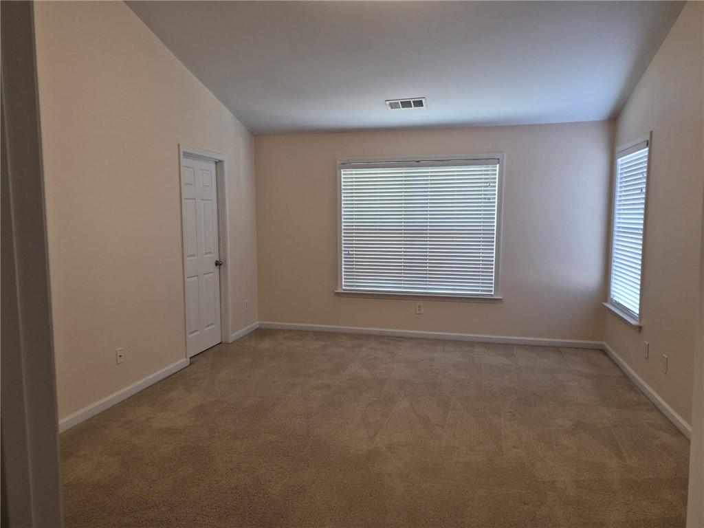 5966 Haddon Place Southeast Mableton, GA 30126 - Photo 19 of 35 an empty room with windows