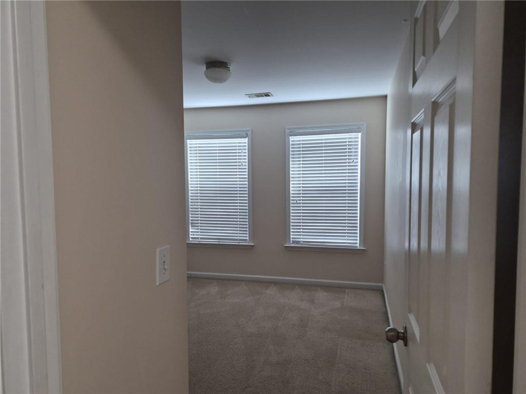 5966 Haddon Place Southeast Mableton, GA 30126 - Photo 25 of 35 a view of an empty room with a window