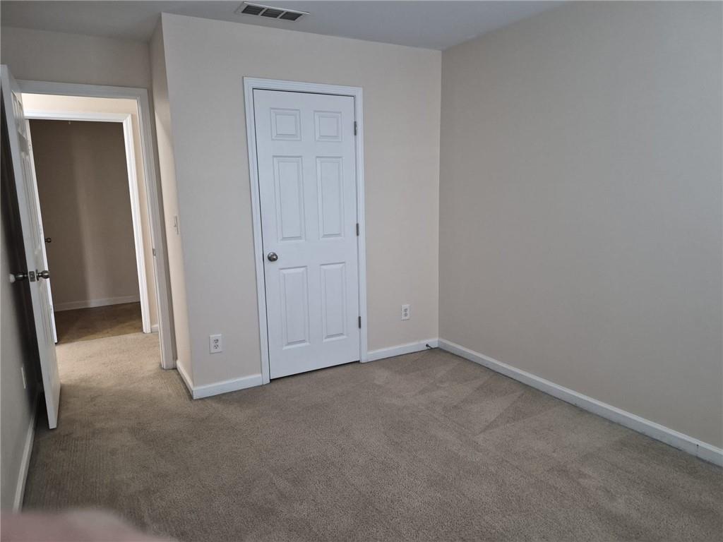 5966 Haddon Place Southeast Mableton, GA 30126 - Photo 30 of 35 an empty room with closet area