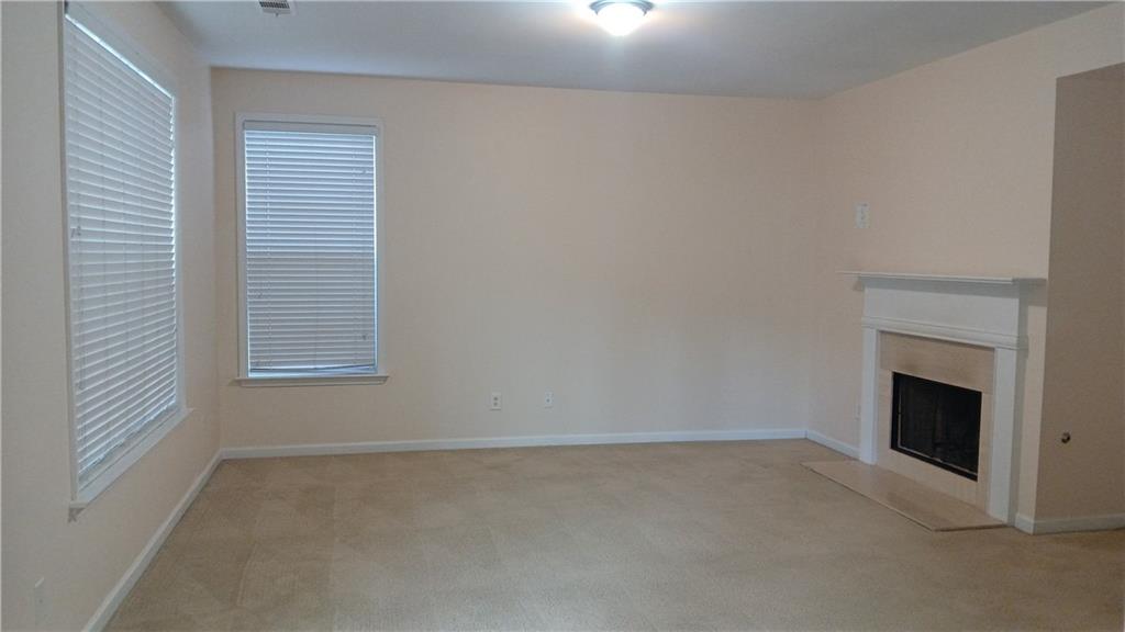 5966 Haddon Place Southeast Mableton, GA 30126 - Photo 4 of 35 a view of empty room with a fireplace