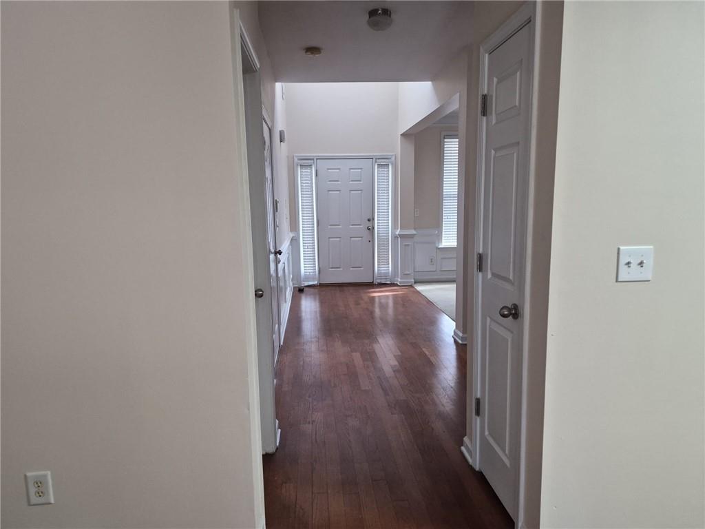 5966 Haddon Place Southeast Mableton, GA 30126 - Photo 5 of 35 a view of a hallway with wooden floor