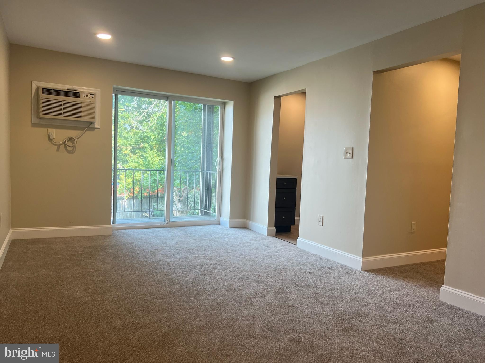 526 Broad Street Emmaus, PA 18049 - Photo 6 of 18 Dining area open to living room access to patio