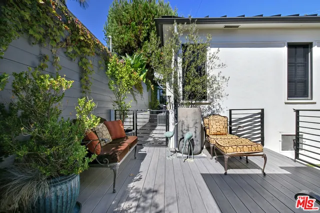 an outdoor space with chairs