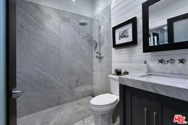 a bathroom with a sink and a toilet