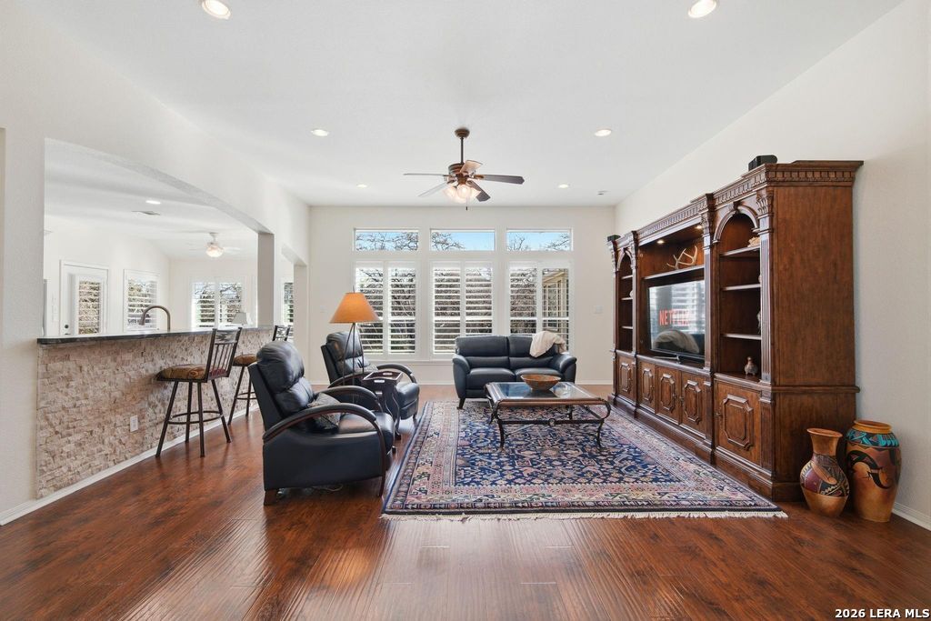 318 River Ridge Boerne, TX 78006 - Photo 10 of 46 a living room with furniture a rug and a flat screen tv