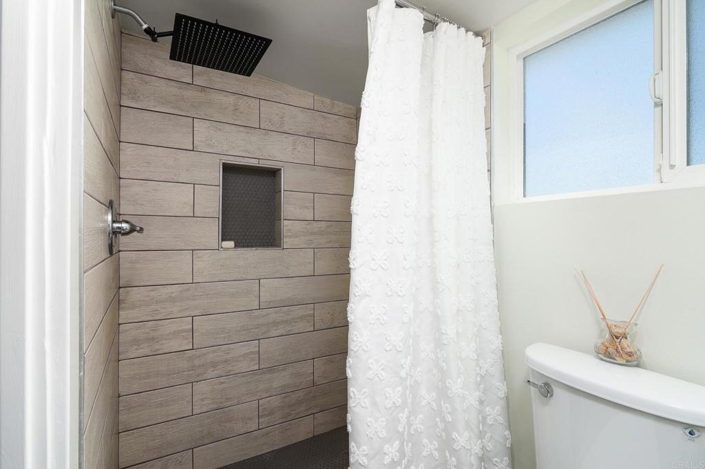 500 Rancheros Drive, Unit 73 San Marcos, CA 92069 - Photo 29 of 52 a bathroom with a sink and a mirror