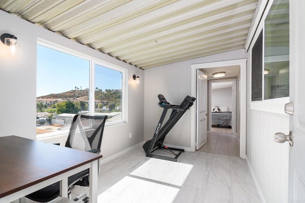 500 Rancheros Drive, Unit 73 San Marcos, CA 92069 - Photo 30 of 52 a view of a livingroom with furniture and windows