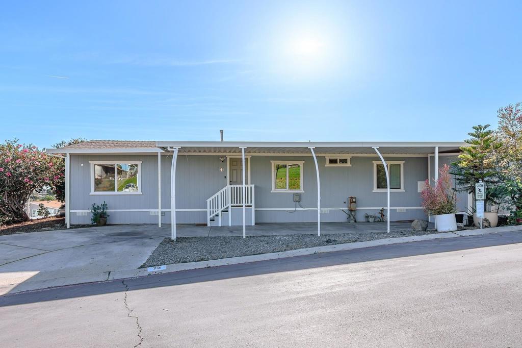 500 Rancheros Drive, Unit 73 San Marcos, CA 92069 - Photo 3 of 52 front view of house with a patio