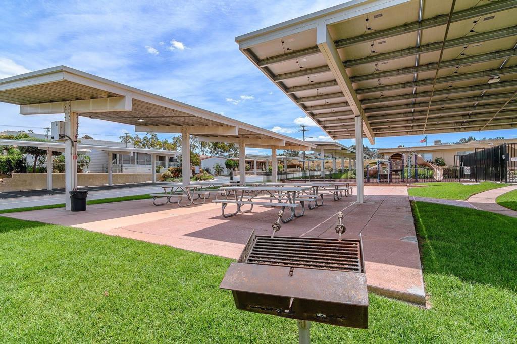 500 Rancheros Drive, Unit 73 San Marcos, CA 92069 - Photo 45 of 52 a view of a backyard with sitting area
