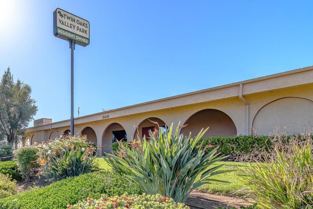 500 Rancheros Drive, Unit 73 San Marcos, CA 92069 - Photo 52 of 52 a front view of a house with garden