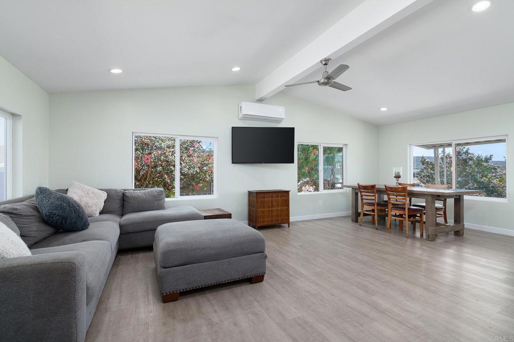 500 Rancheros Drive, Unit 73 San Marcos, CA 92069 - Photo 6 of 52 a living room with furniture and a flat screen tv