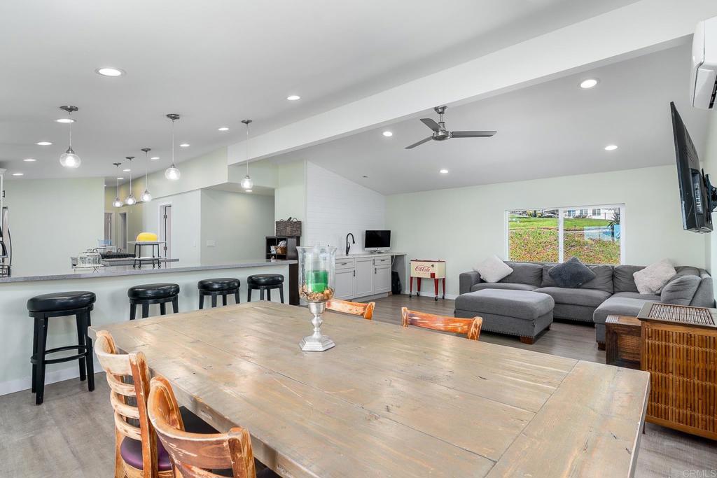 500 Rancheros Drive, Unit 73 San Marcos, CA 92069 - Photo 9 of 52 a living room with furniture and kitchen view