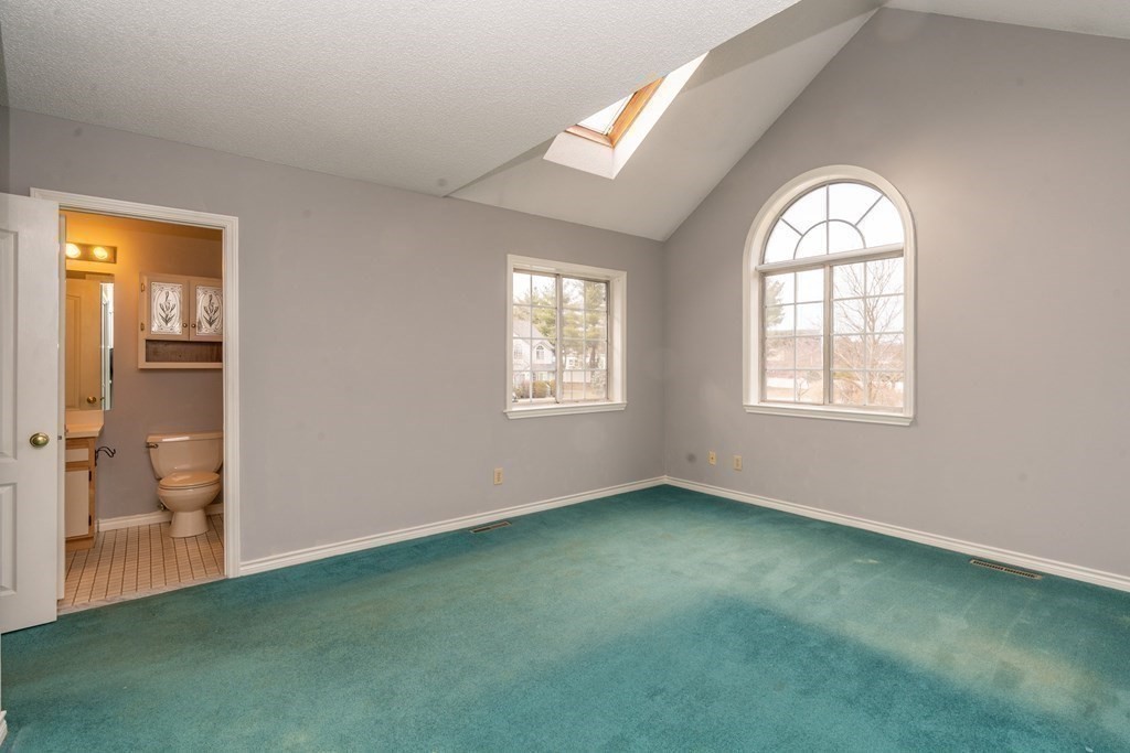 104 Johnson Road, Unit 106 Chicopee, MA 01022 - Photo 19 of 24 an empty room with a window