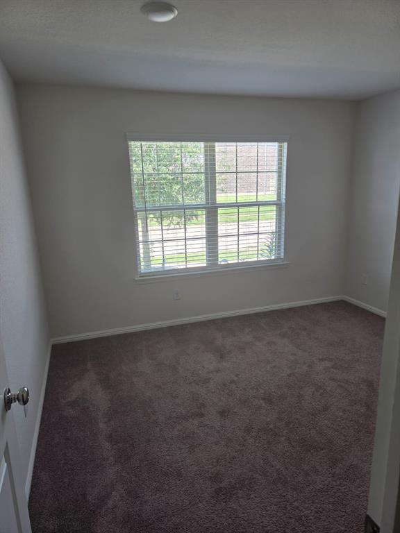 1512 Springtree Drive McKinney, TX 75071 - Photo 14 of 23 an empty room with a window