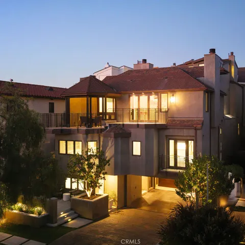 a view of a house with a yard balcony