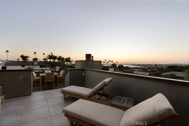 a kitchen with a refrigerator and a stove