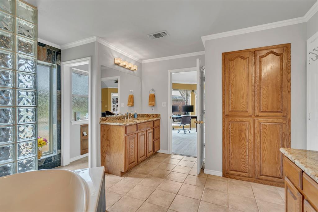 50 Buckingham Lane Allen, TX 75002 - Photo 27 of 39 a view of a kitchen with refrigerator and windows
