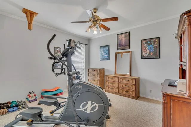 a view of a dinning table and chairs in patio